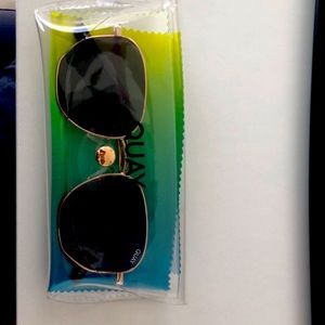 Quay big time gold rimmed ladies sunglasses.